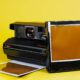 An old Polaroid ImagePro camera with a pack of film.